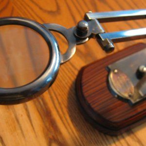 Reproduction of an 1814 LONDON Magnifying Glass on stand in antiqued Brass